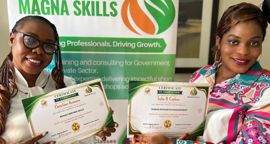 Staff participants receive certificates in recognition of their successful completion of a capacity - building training program in Accra, Ghana.