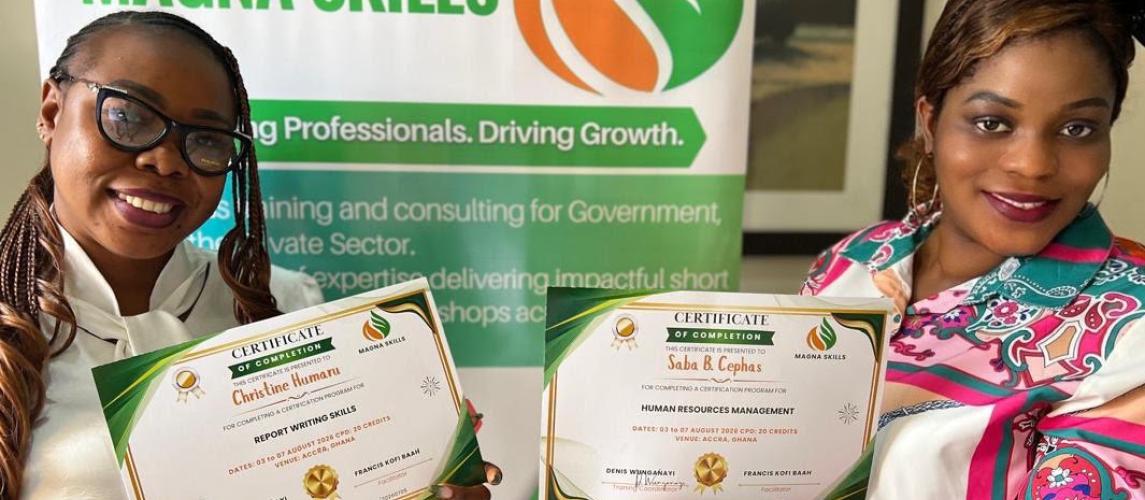 Staff participants receive certificates in recognition of their successful completion of a capacity - building training program in Accra, Ghana.